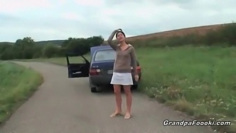 Grandpa Seduced By A Charming Young Woman During A Road Trip